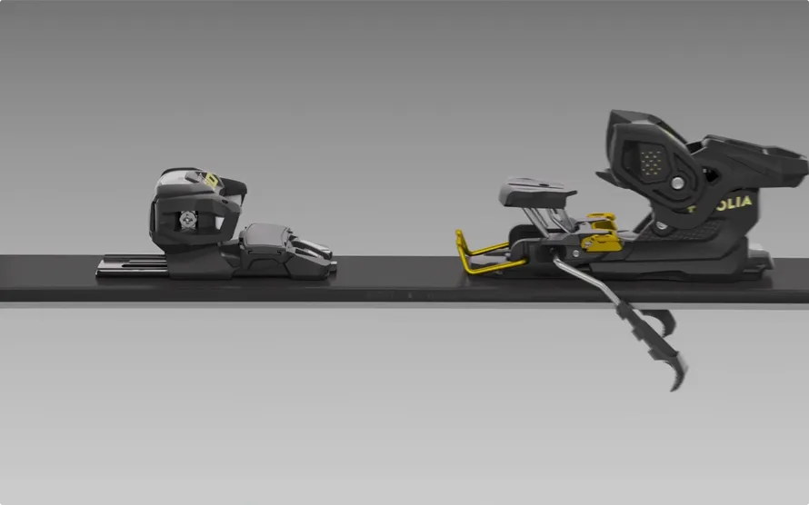 Крепление компании TYROLIA крупным планом, установленное на горной лыже.