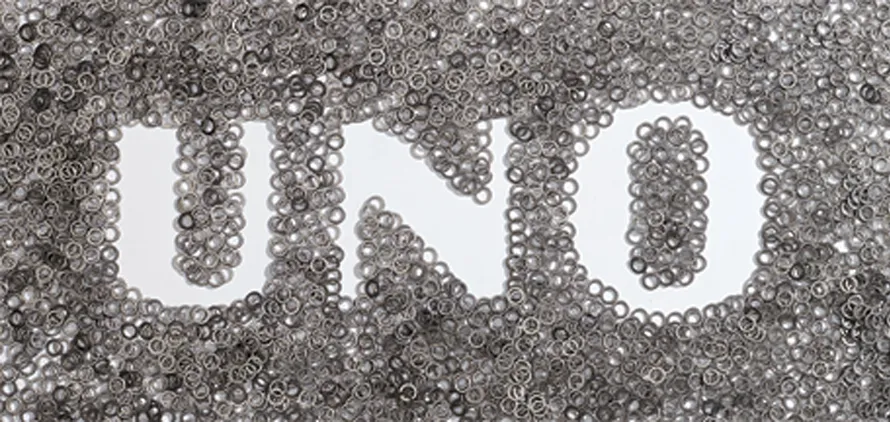 Название компании UNO, составленное из шайбойчек.